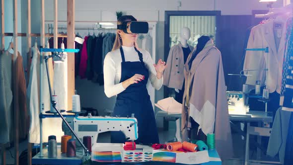 A Seamstress is Using VRglasses While Working