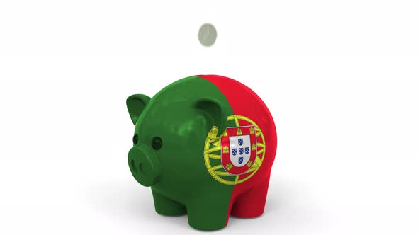 Coins Fall Into Piggy Bank Painted with Flag of Portugal