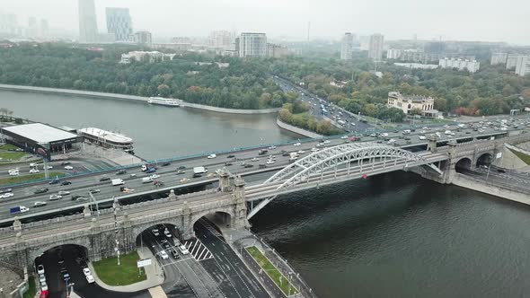 Traffic on a Car and Train Bridge in Big City