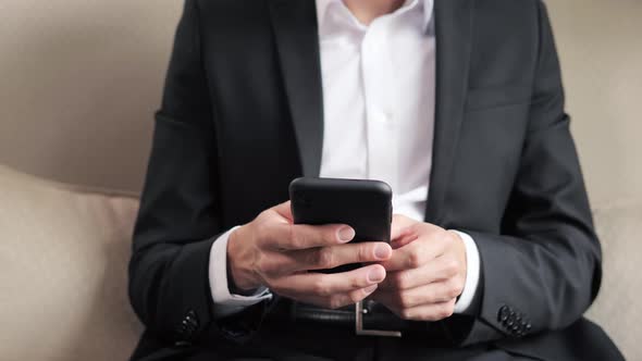 Close Up Male Hands with Mobile Phone