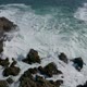 sea waves crashing against the rocks on the beach - VideoHive Item for Sale