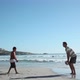 Father and son playing ball on beach - VideoHive Item for Sale