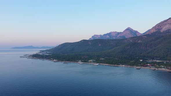 Aerial Viev Shore Near Mountains At Dawn