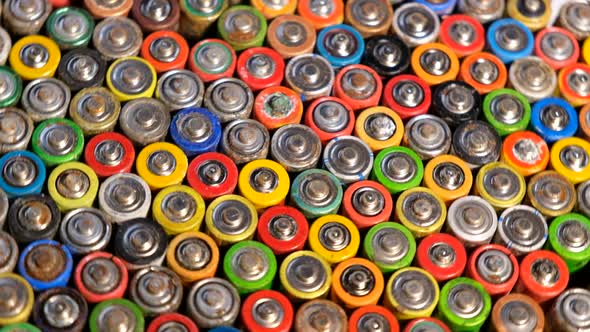 Many used batteries. Harmful effects of batteries on the nature of the Earthies.