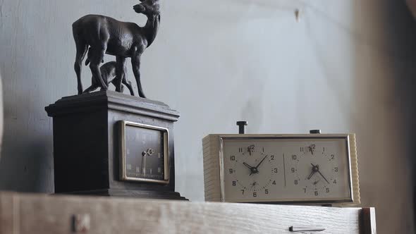 Male Hand Presses the Old Chess Clock