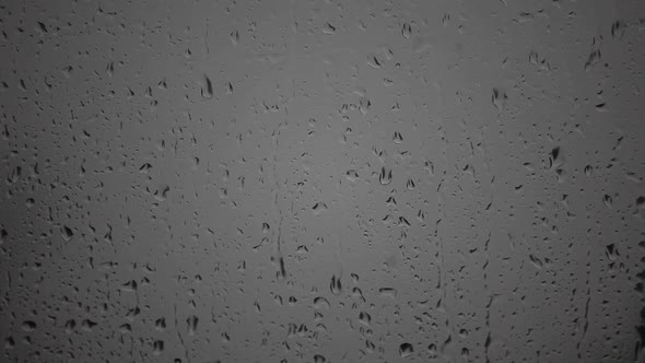 footage of window rain drops