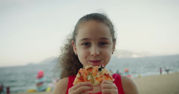 Portrait Happy Funny Little Girl Eagerly Eat Delicious Pizza Smiling Child Looking at Camera on