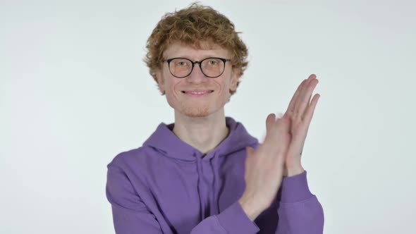 Clapping By Redhead Young Man White Background