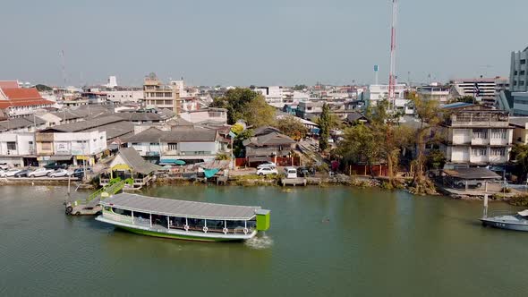 MAEKLONG THAILAND DECEMBER 15 2019 Amazing Aerial View of Maeklong Cityscape with River and Railway