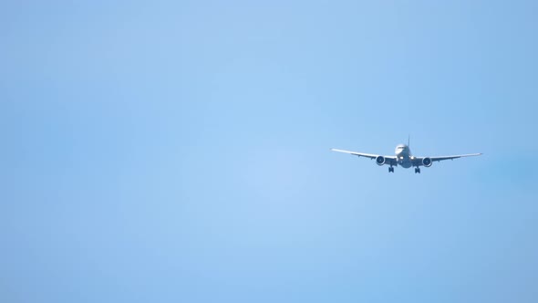 Airplane Approaching Over Ocean