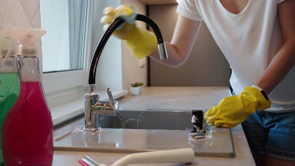 Woman Cleaning Kitchen Sink Daily Chores and Housework