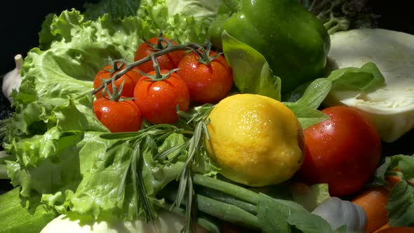 Vegetables on a Tray Close-up. Vegetables on the Kitchen Counter. Tomato Cucumber Zucchini Onion