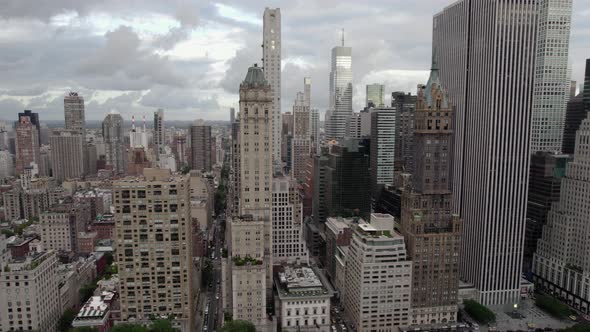 Aerial view of tall buildings in Midtown east in cloudy Manhattan, New York, USA