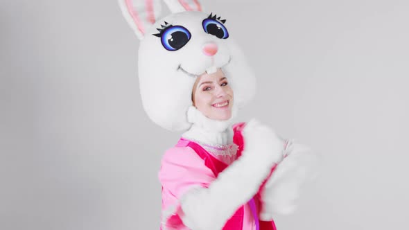 Portrait of a young cute girl in a beautiful hare costume