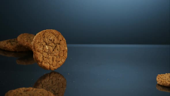 Cookies falling and bouncing in ultra slow motion 1500fps - reflective surface - COOKIES