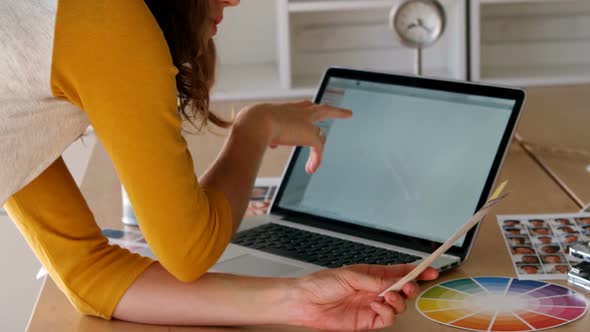 Female executive working at desk