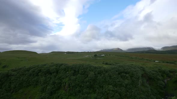 Panoramic view a green valley in Scotland