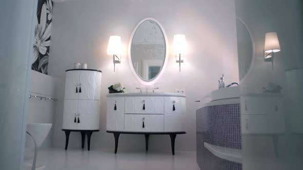 Stylish modern light bathroom with luxury furniture in the style of Provencal