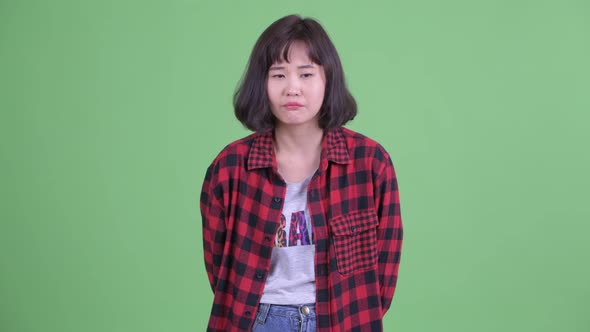 Sad Asian Hipster Woman Talking and Looking Depressed