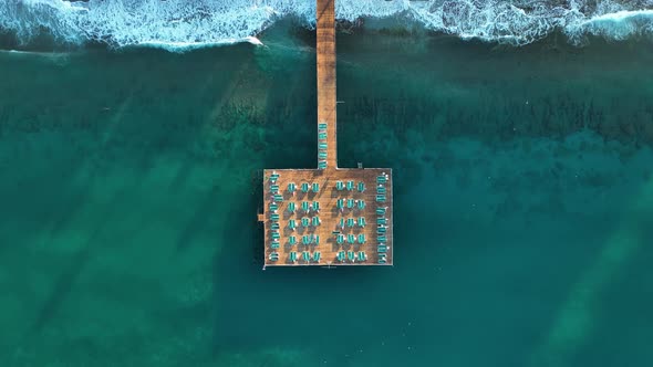 Empty pier by the sea aerial view 4 K Turkey Alanya