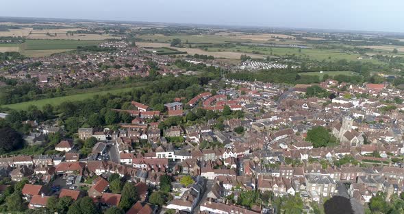 Aerial pan above Sandwich village in Kent