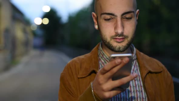 Young man using smartphone