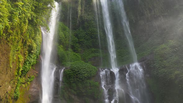 Sekumpul Waterfall in the Heart of Bali Island, Indonesia. Slow Motion