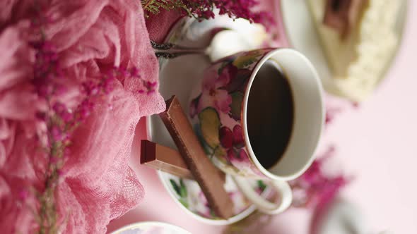 Delicious Dessert on Pink Background. Hot Coffee or Dark Chocolate with White Chocolate