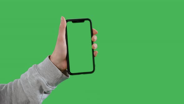 Lady Using App on Device with Green Screen