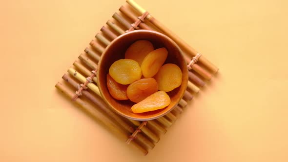 Dropping Apricot Fruit Half in a Bowl  Slow Motion