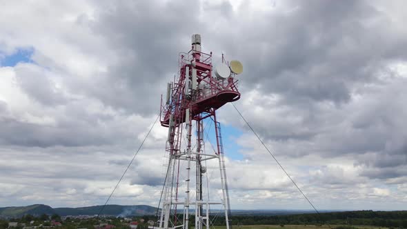 Aerial View of Telecommunications Cell Phone Tower with Wireless Communication Antennas for Network