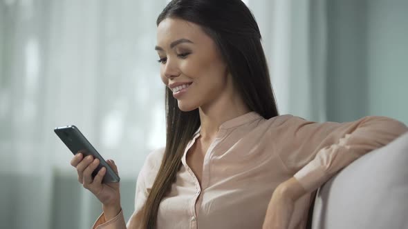 Beautiful Woman Enjoying Phone Application, Studying Modern Program Interface