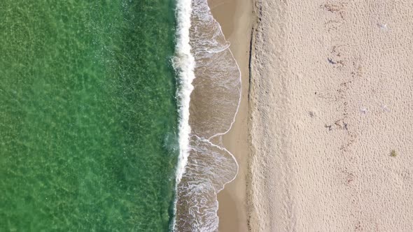 Aerial View of Clear Turquoise Sea and Waves