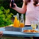 Childrens  party.Children open  fruit drinks  in a summer sunny garden. summer drink. - VideoHive Item for Sale
