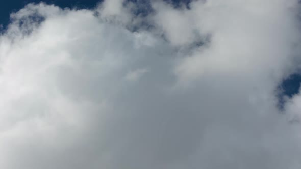 white clouds in blue sky background