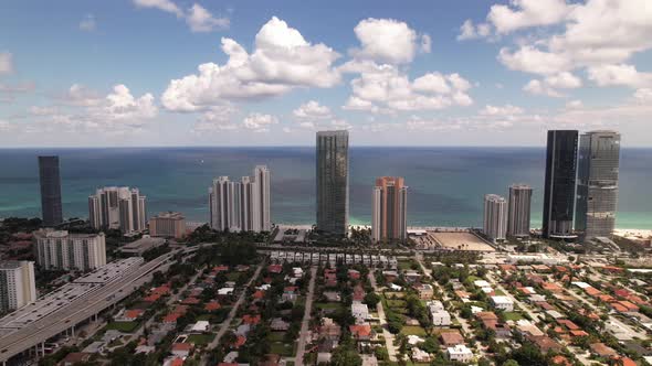 Aerial side view Sunny Isles Beach FL 5k drone footage