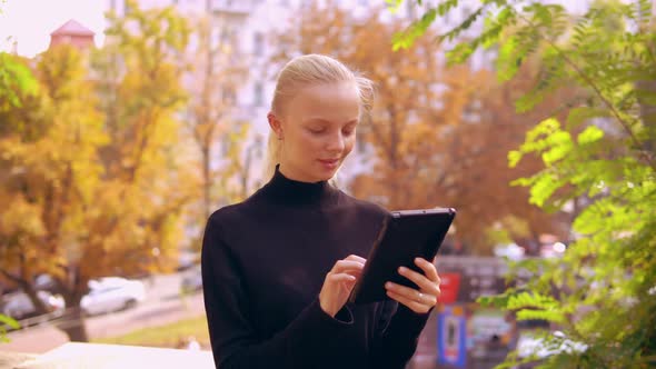 Portrait Caucasian Woman Use Digital Tablet Outdoors