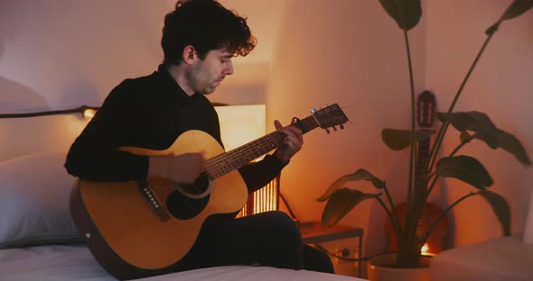 Young man playing guitar