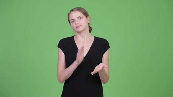 Young Happy Beautiful Businesswoman Clapping Hands