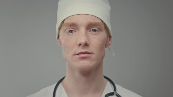 Face Of Young Doctor In White Hat