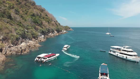 Motorboats moored off Koh Racha Yai island. Diving paradise holidays concept