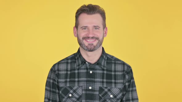 Portrait of Attractive Middle Aged Man Smiling at Camera