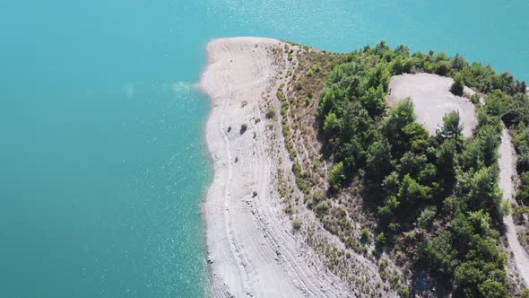 AERIAL Panoramic view: Aerial top view of summer green trees with a splendid mountain 