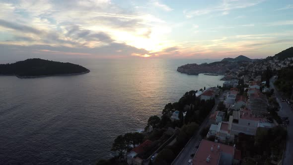Aerial shot of Dubrovniks coast at sunset