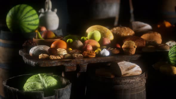 Food Table with Wine Barrels and Some Fruits, Vegetables and Bread