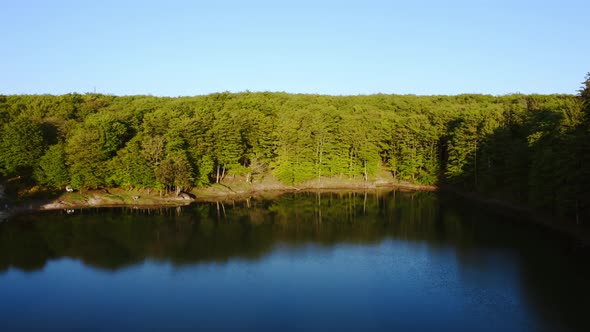 Aerial view of mountain lake at sunset