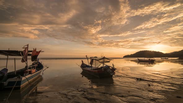 Timelapse panning from right to left with burning cloud at the seaside.