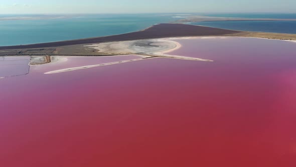 Beautiful top view of the salty, pink lake. Beautiful pink sunrise.