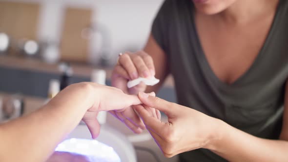 Close up video of women during making nail beauty treatments. Shot with RED helium camera in 8K.