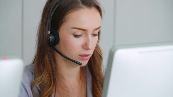 Business People Wearing Headset Working in Office